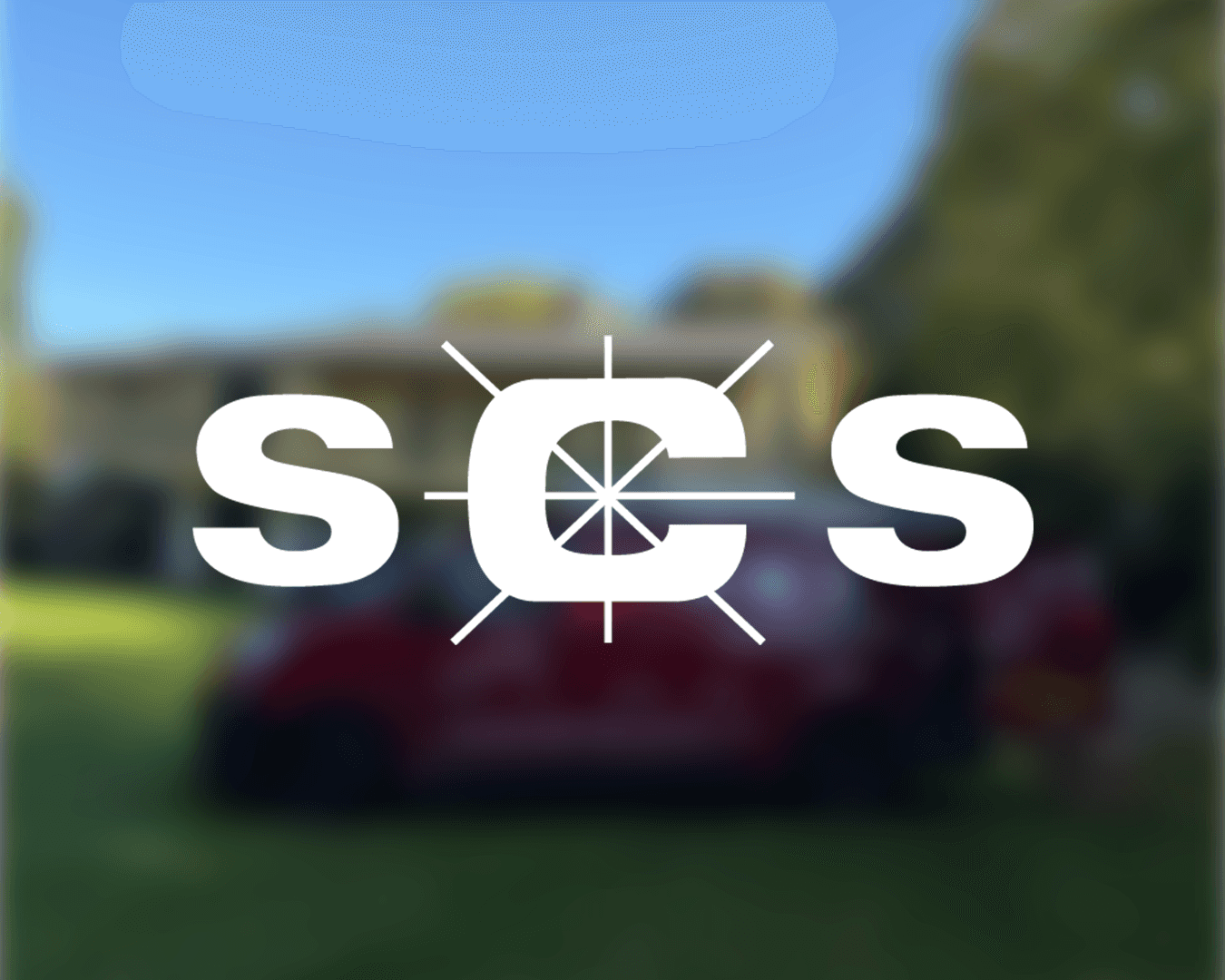 a woman in a white shirt is posing for a picture