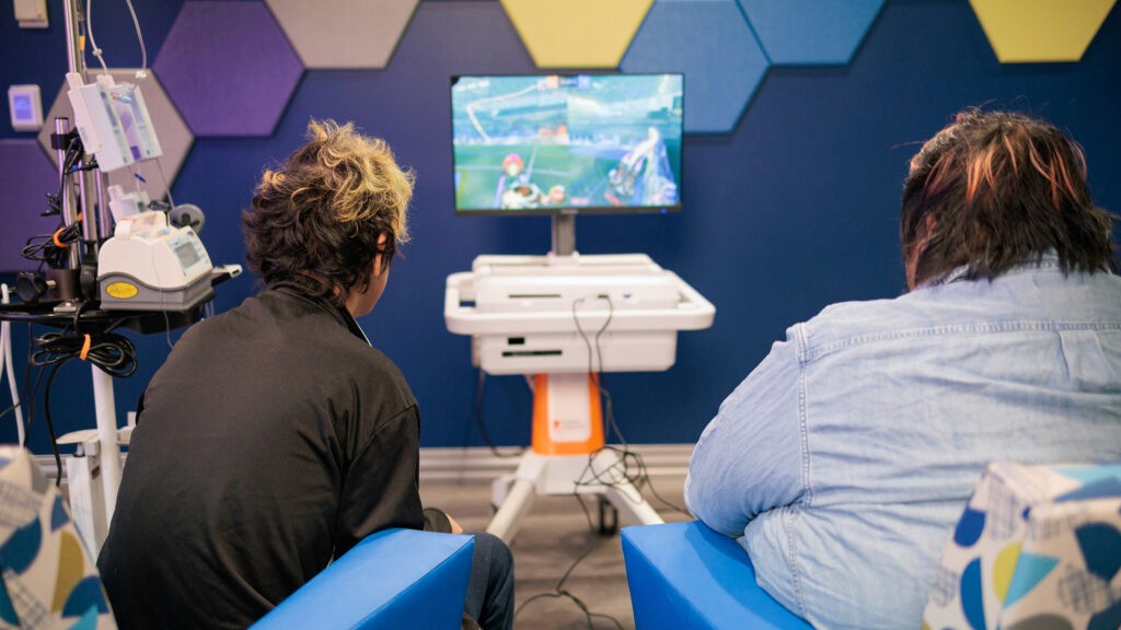 Patients playing Rocket League on a GO Kart.
