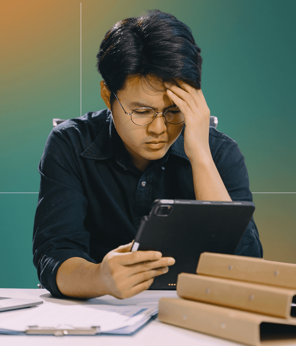 woman sitting around table holding tablet