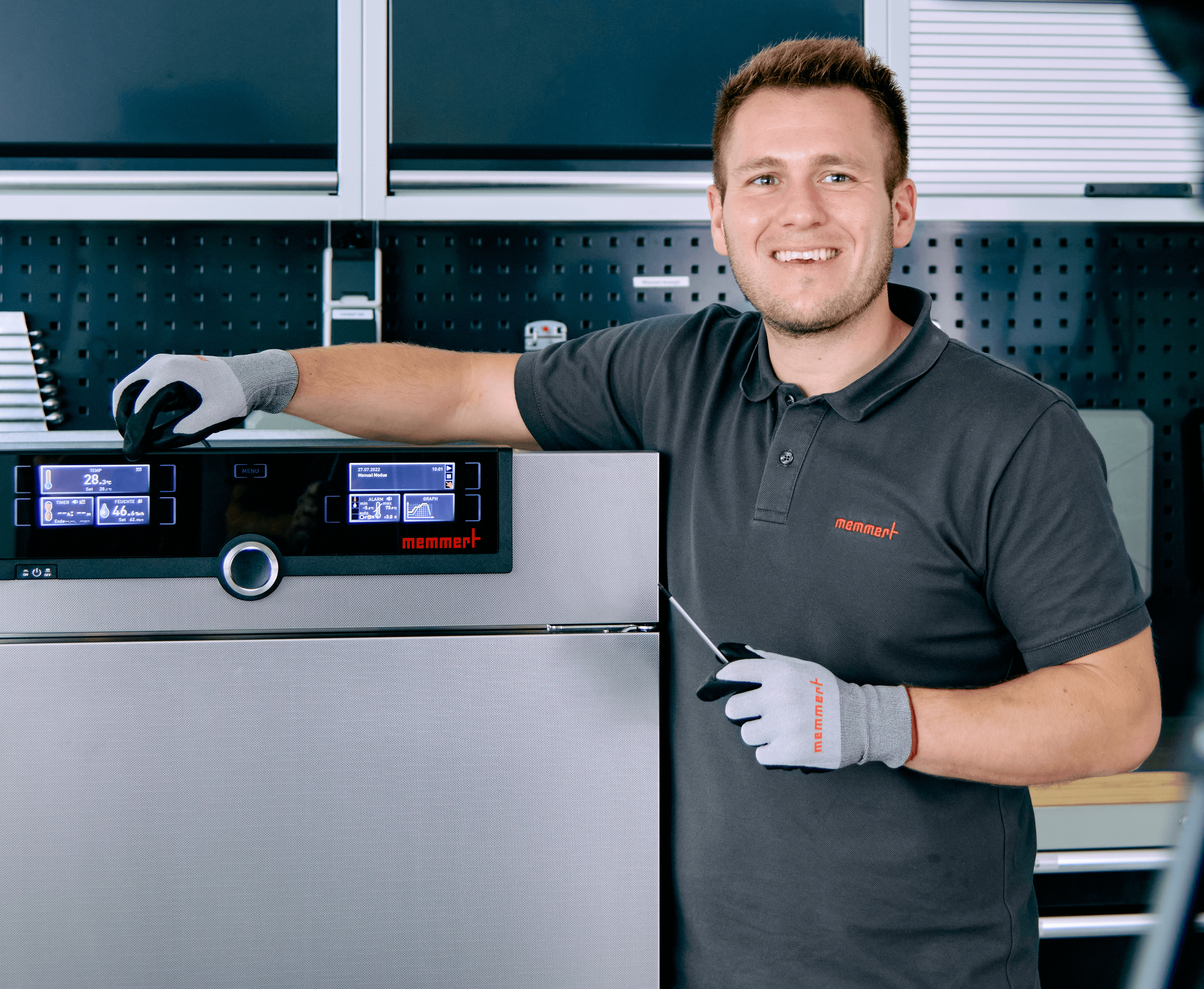 Memmert USA employee in from of unit