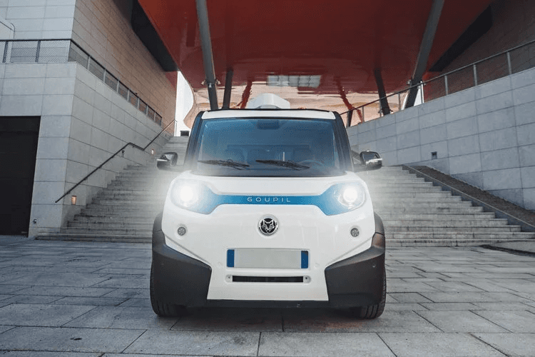 a golf cart with a golf bag