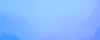  A man stands in front of a cascading waterfall, surrounded by lush greenery and mist rising from the water.