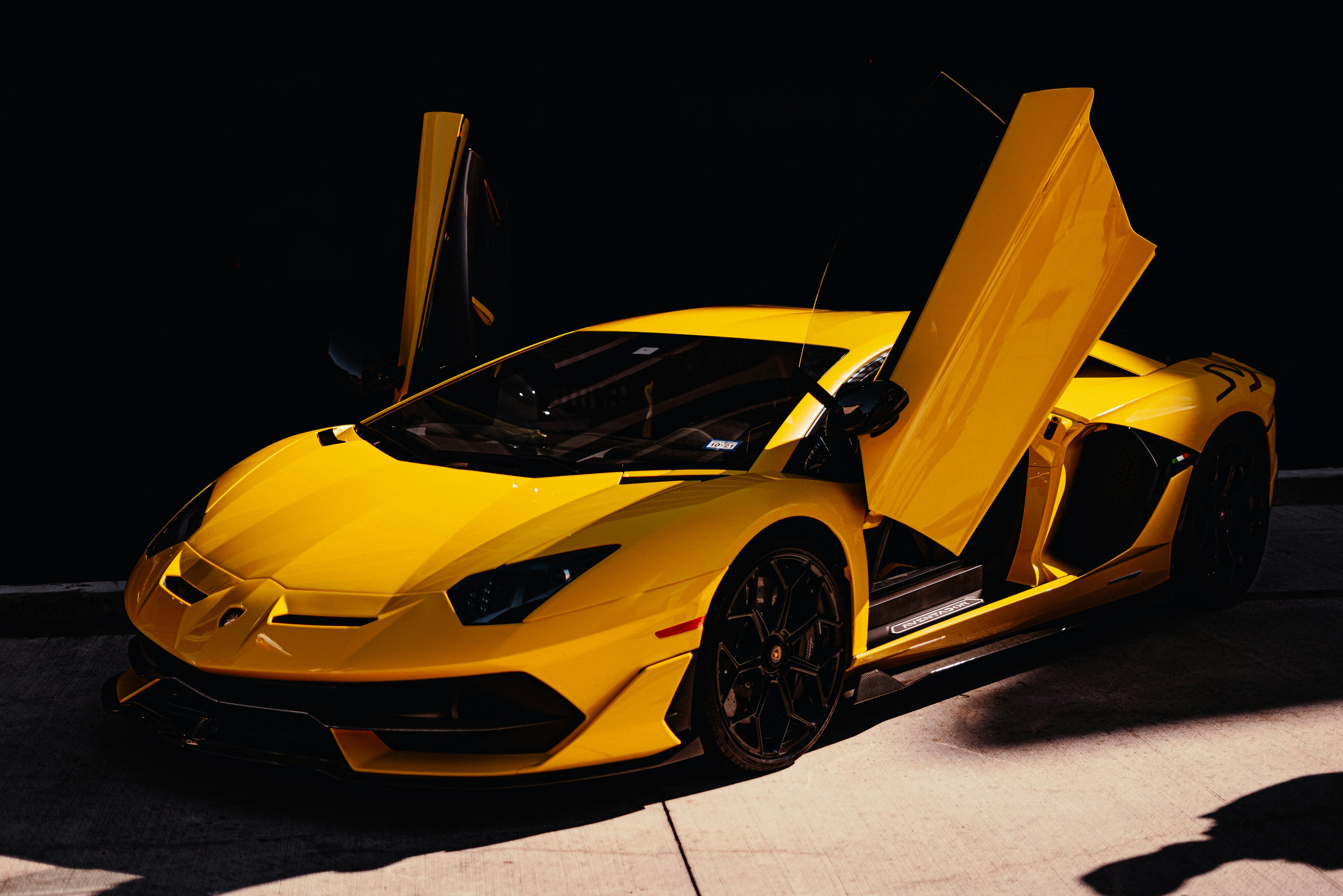 Lamborghini yellow open wing doors