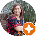 Woman lying in a shavasana pose after a restful yoga practice