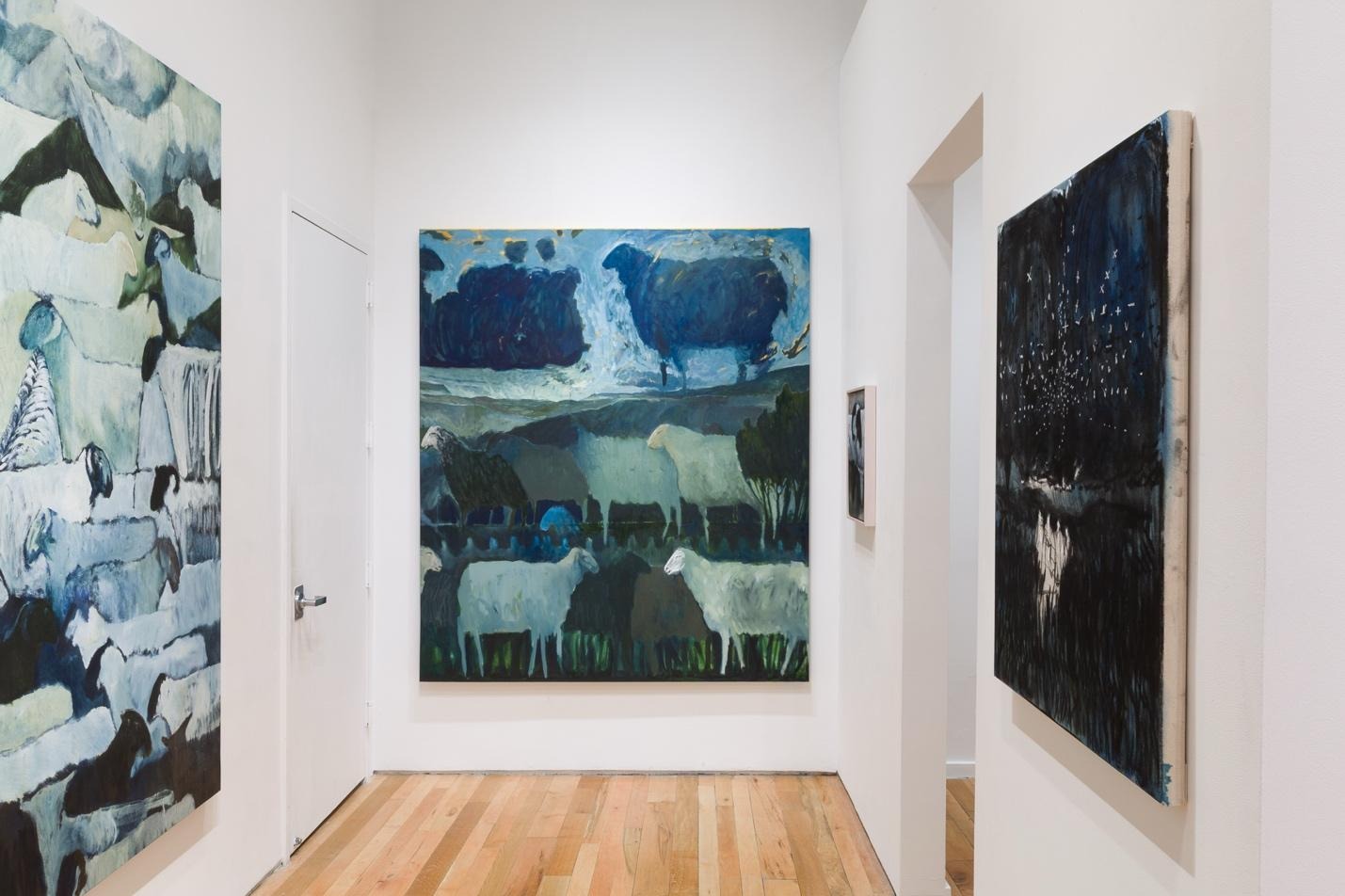 A room with paintings on the wall

AI-generated content may be incorrect.