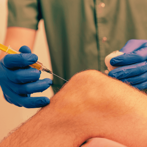 A person receiving PRP for Pain injection into knee