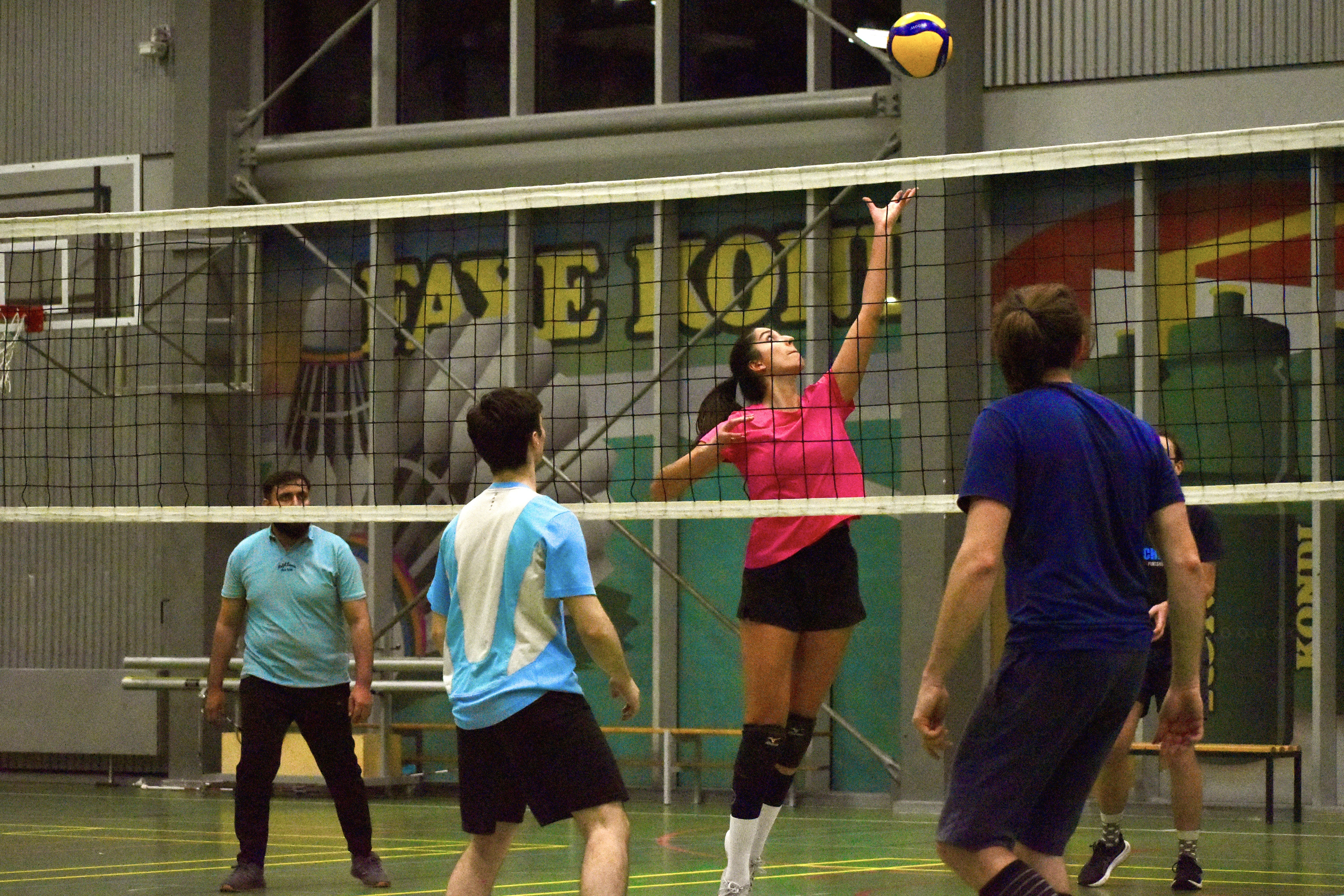 a cocktail glass with a cherry