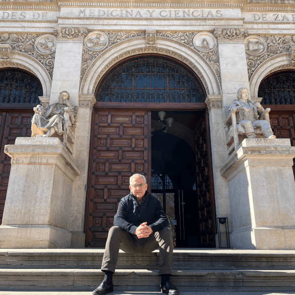 Jaime Sanaú sitting outside of Paraninfo