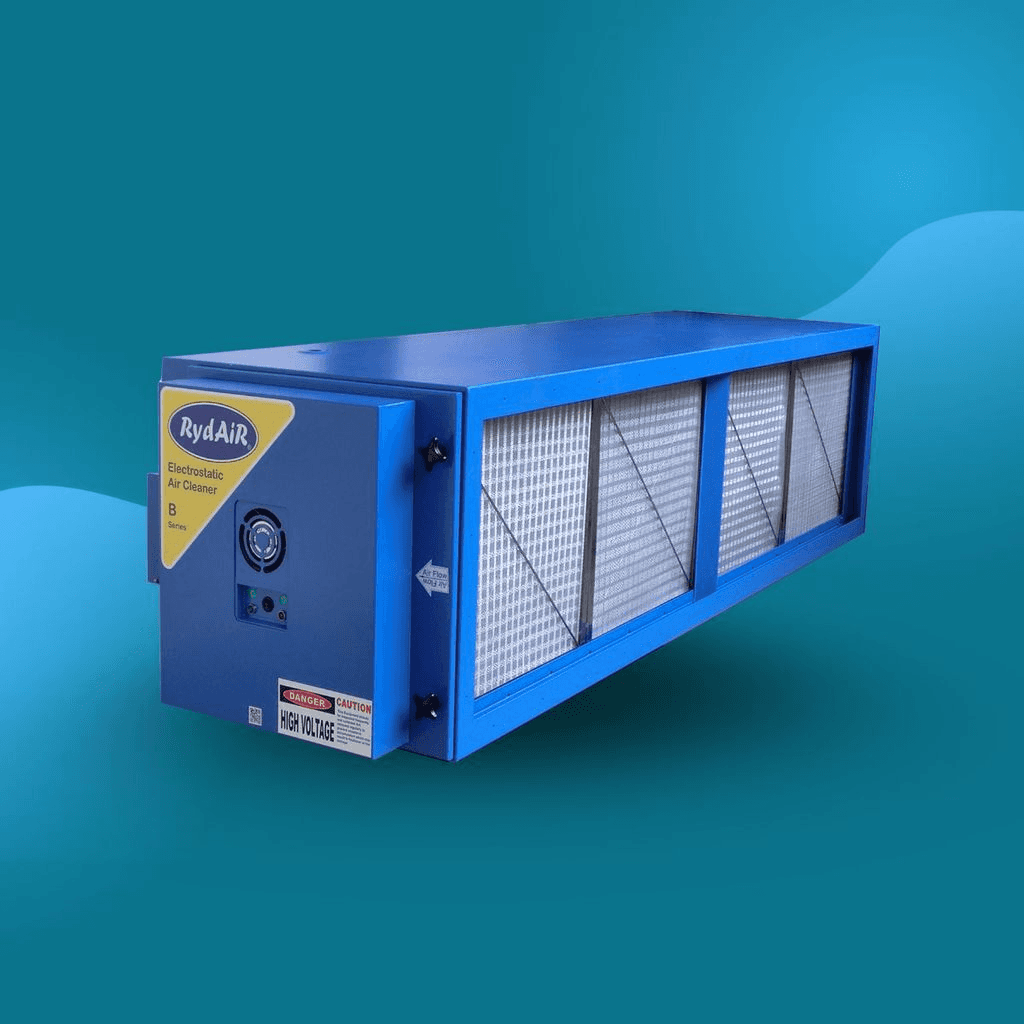 man standing in front of people sitting beside table with laptop computers