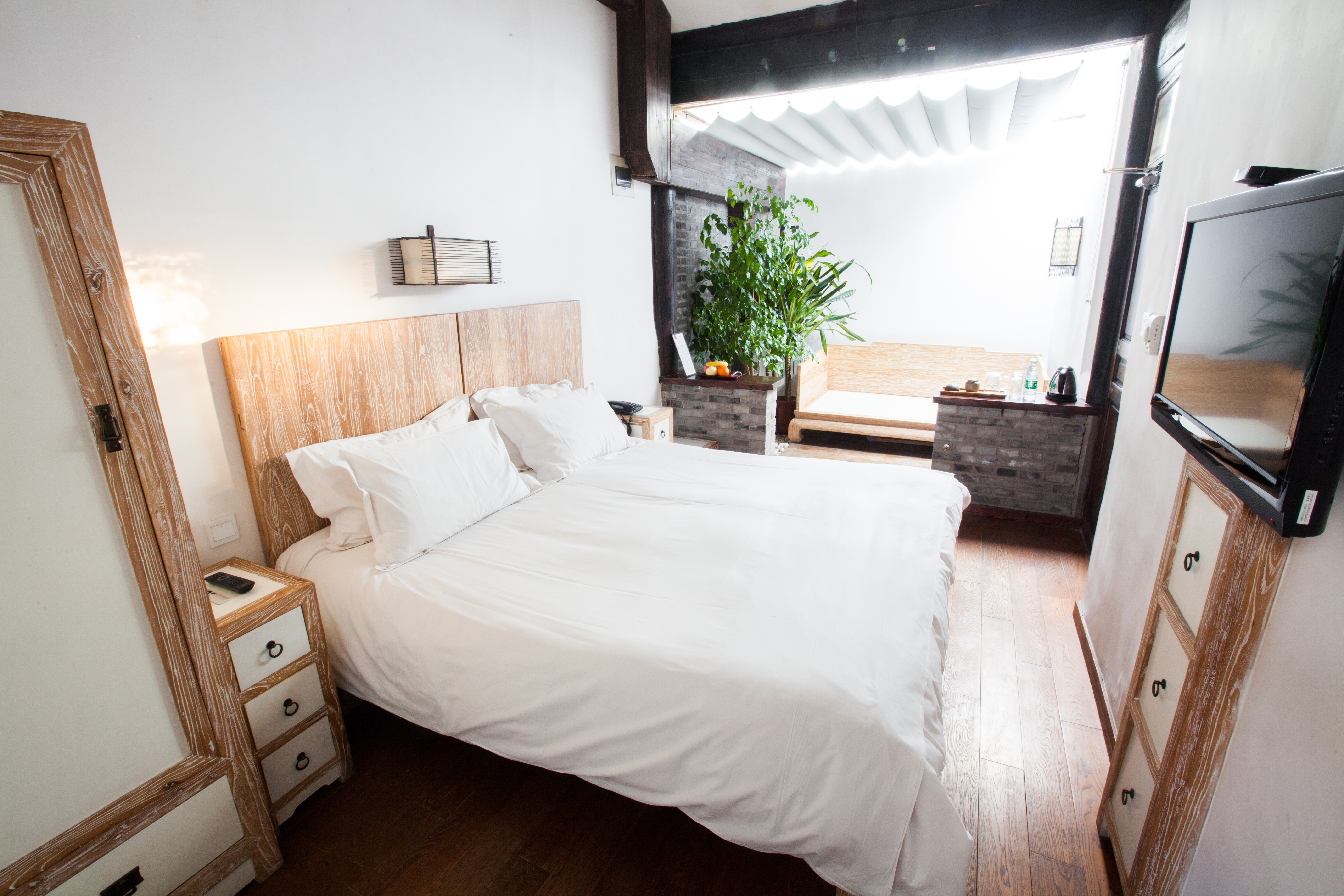 King room interior with warm wood details