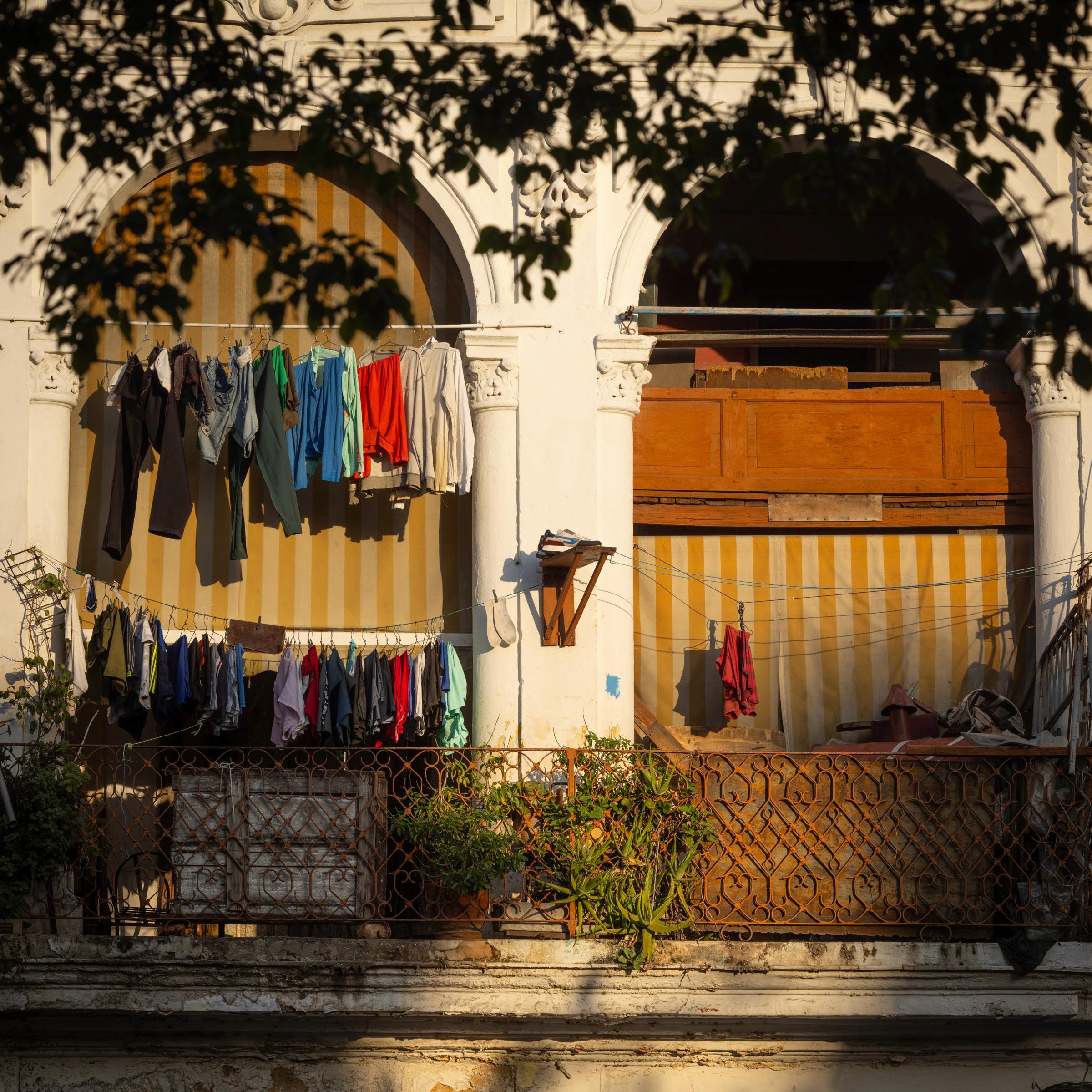 Laundry hangs from a balcony on the Paseo del Prado. Havana, Cuba