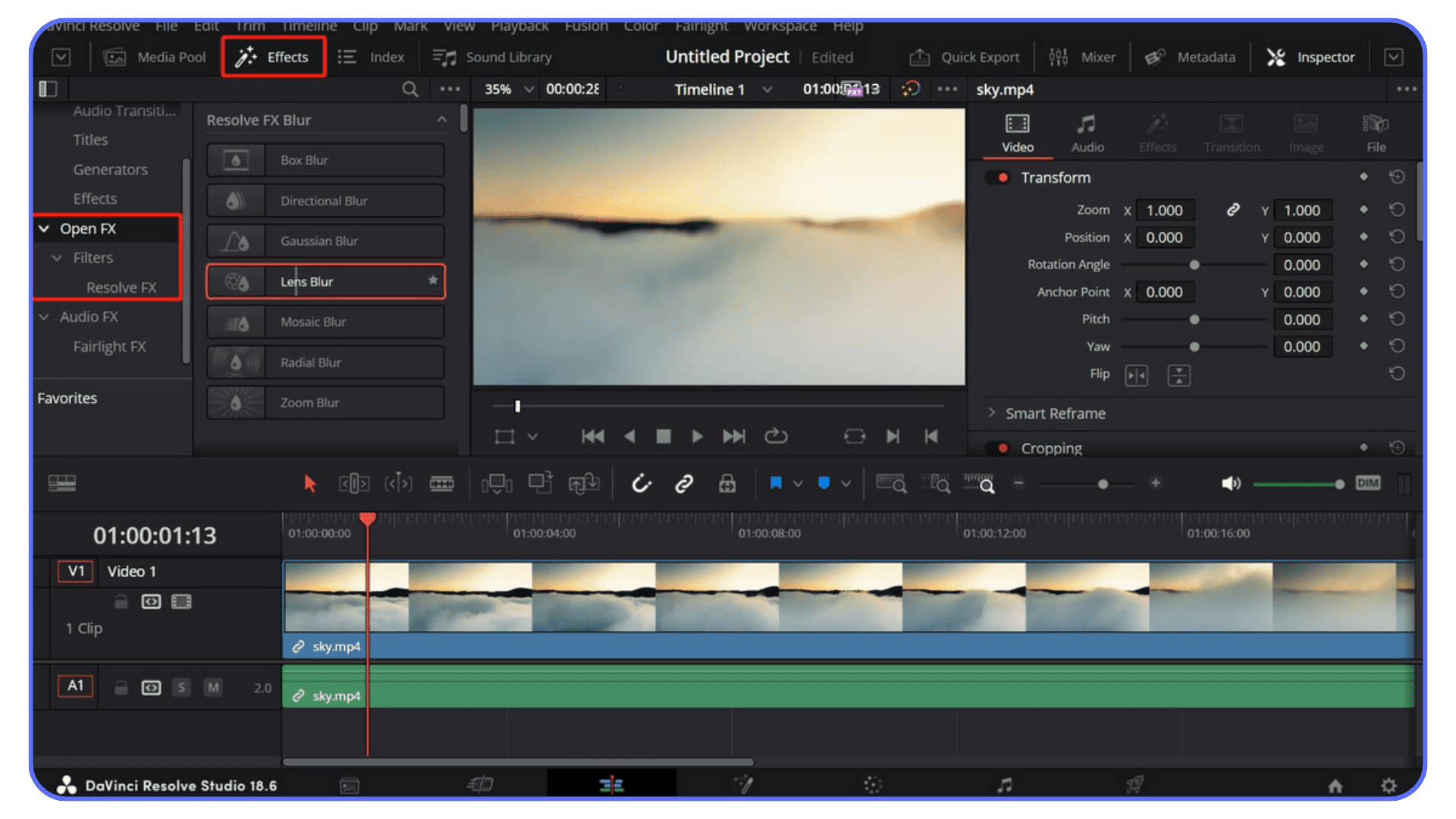 DaVinci Resolve interface showing the Lens Blur effect selected in the OpenFX panel with a blurred video preview.
