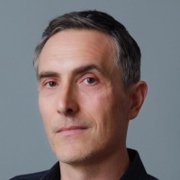 Headshot of Fortress CEO