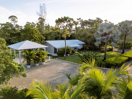 two gray rock formations on the middle of sea at daytime