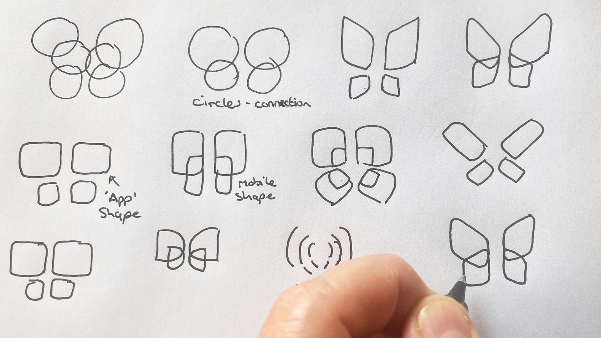 Mariposa logo design exploration sketches