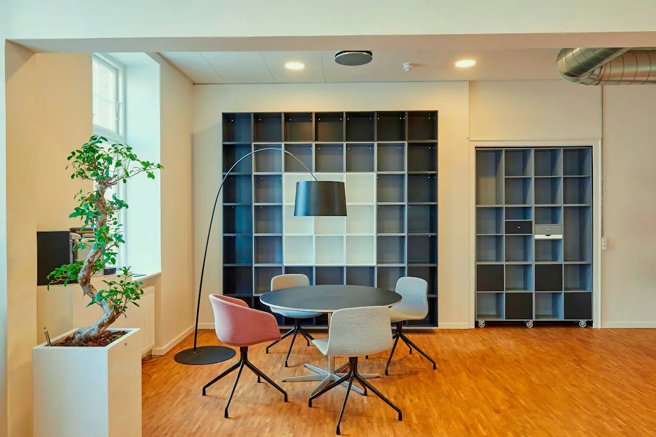 Office with a small metting table.