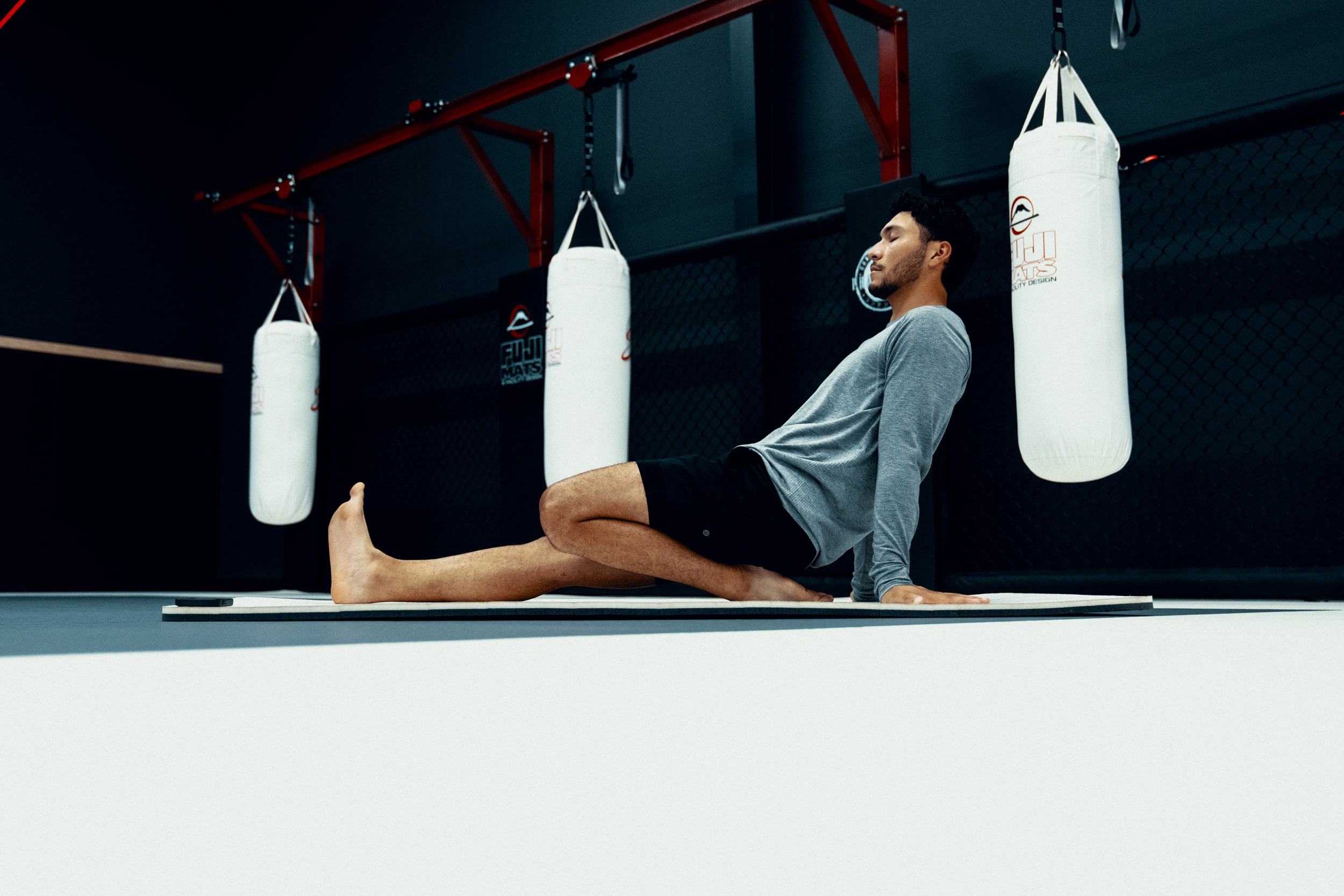 Man Stretching in Gym - Lower Body Mobility Exercises