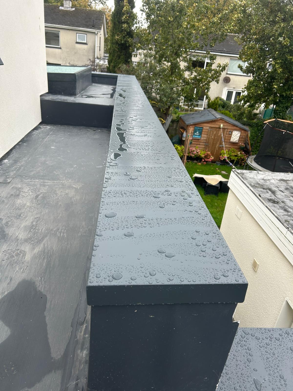 White streak of light forming an abstract shape on a black background.