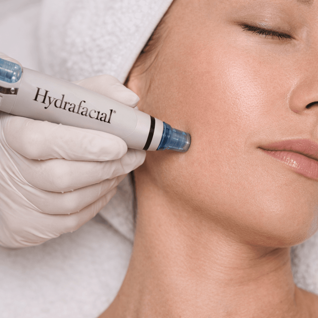 woman doing liposuction on her face