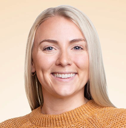 Young women wearing peach short-sleeve button-up shirt