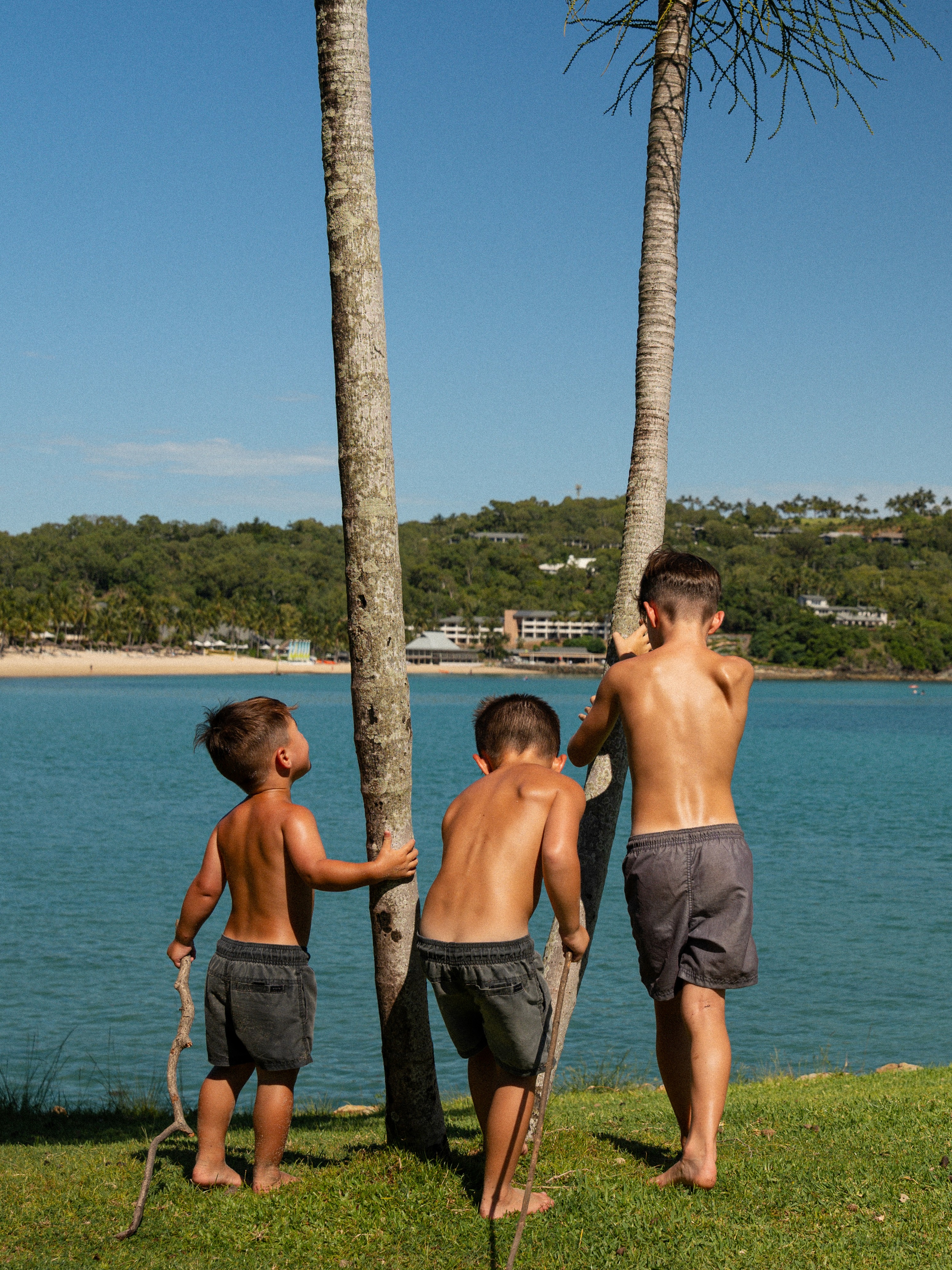 Portrait of a person in a pink sweater against a light background