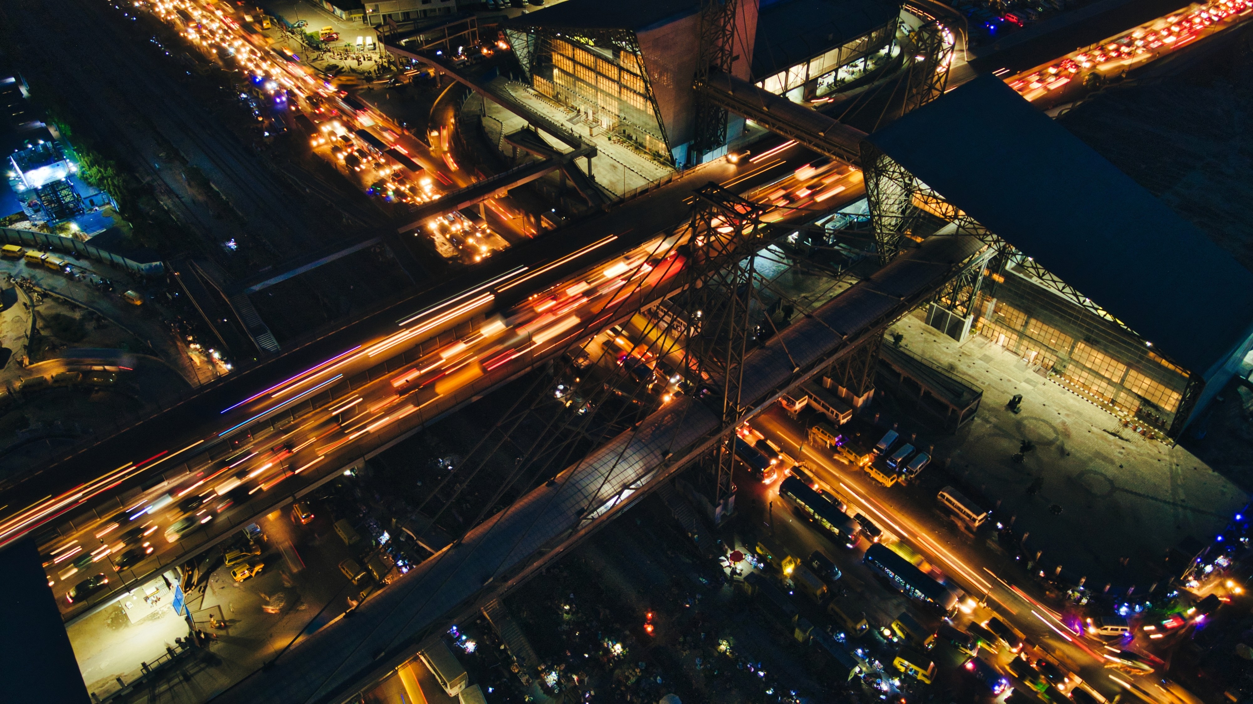 Drone shot of a running track at night