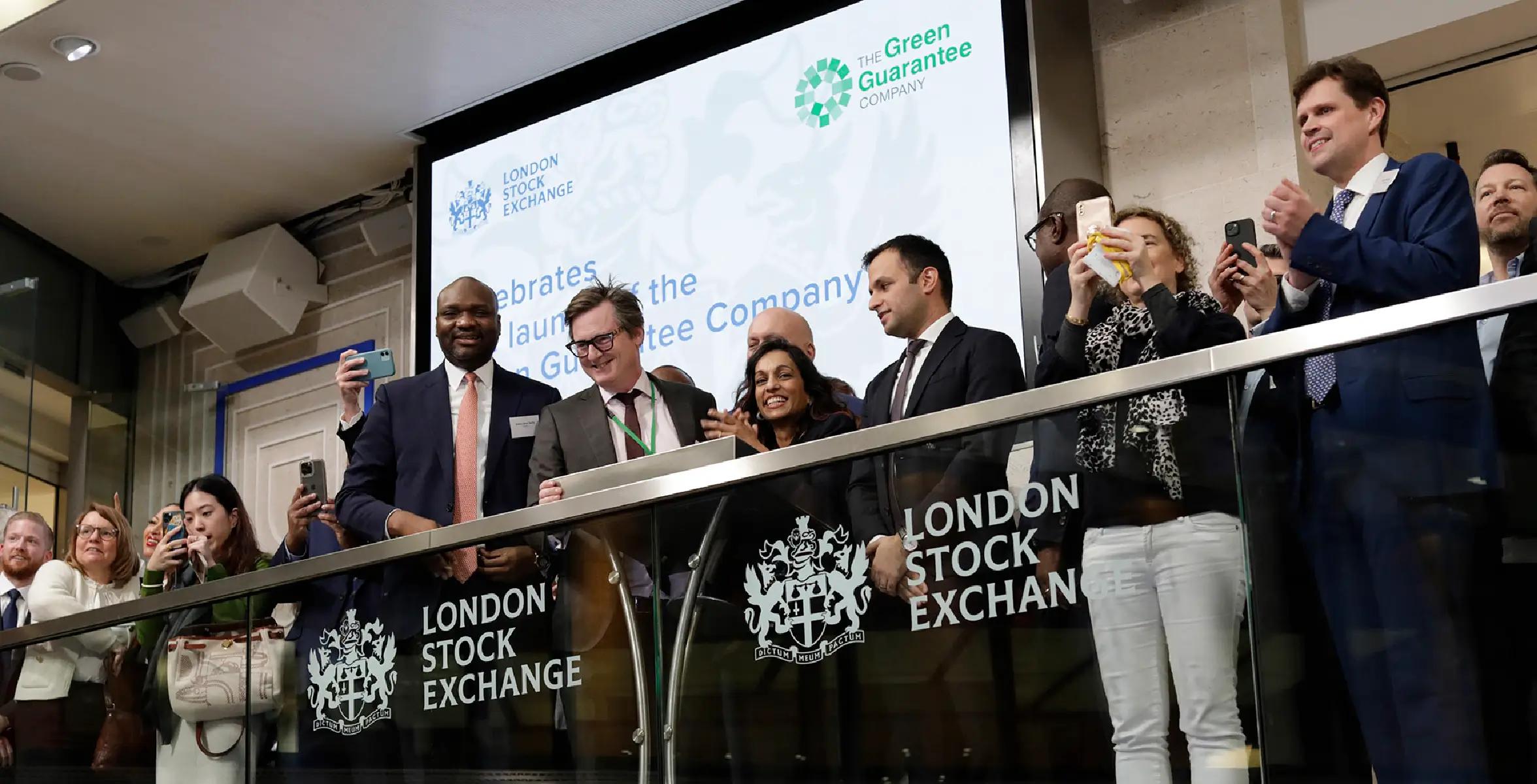 People celebrating the launch of GGC at the London Stock Exchange