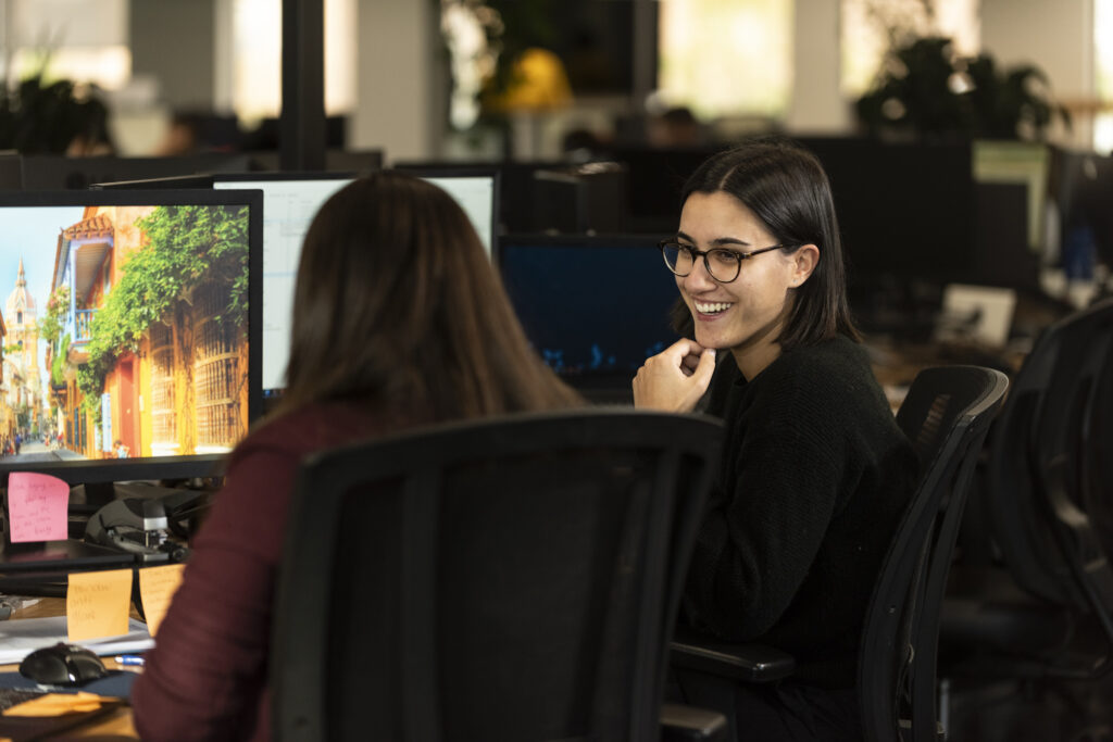 A group of people having a meeting at the office