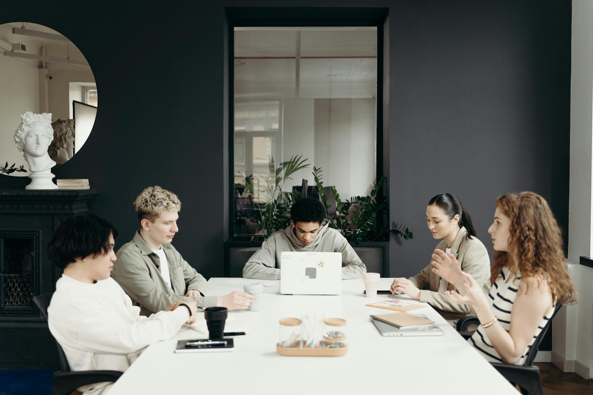 A team in a office having a discussion