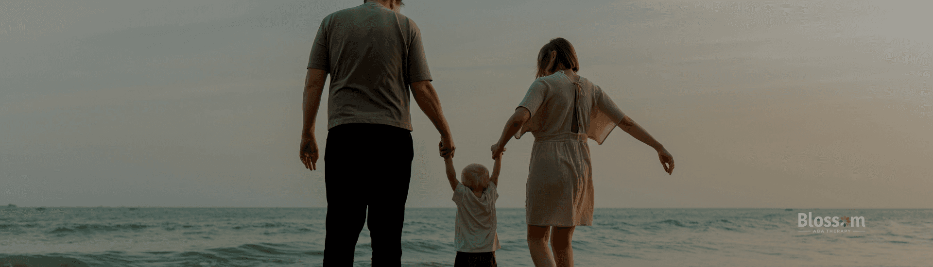 Parents helping their child with ABA therapy
