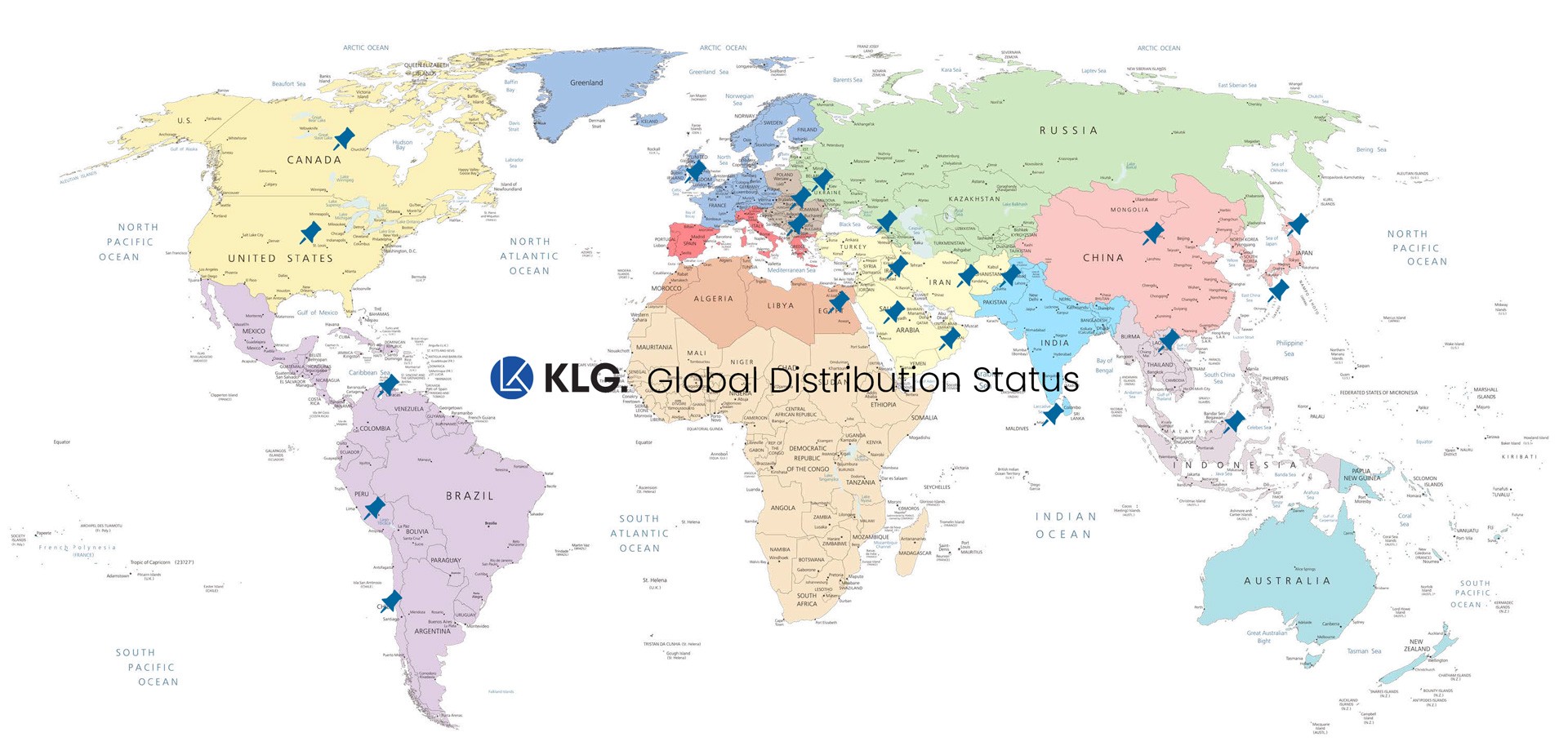 Group of diverse office colleagues posing together, smiling and looking at the camera.