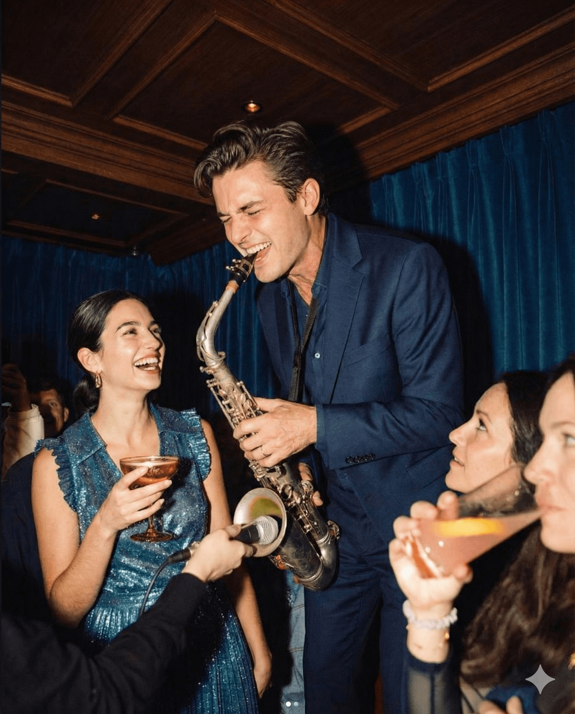 husband and wife working happily on a laptop