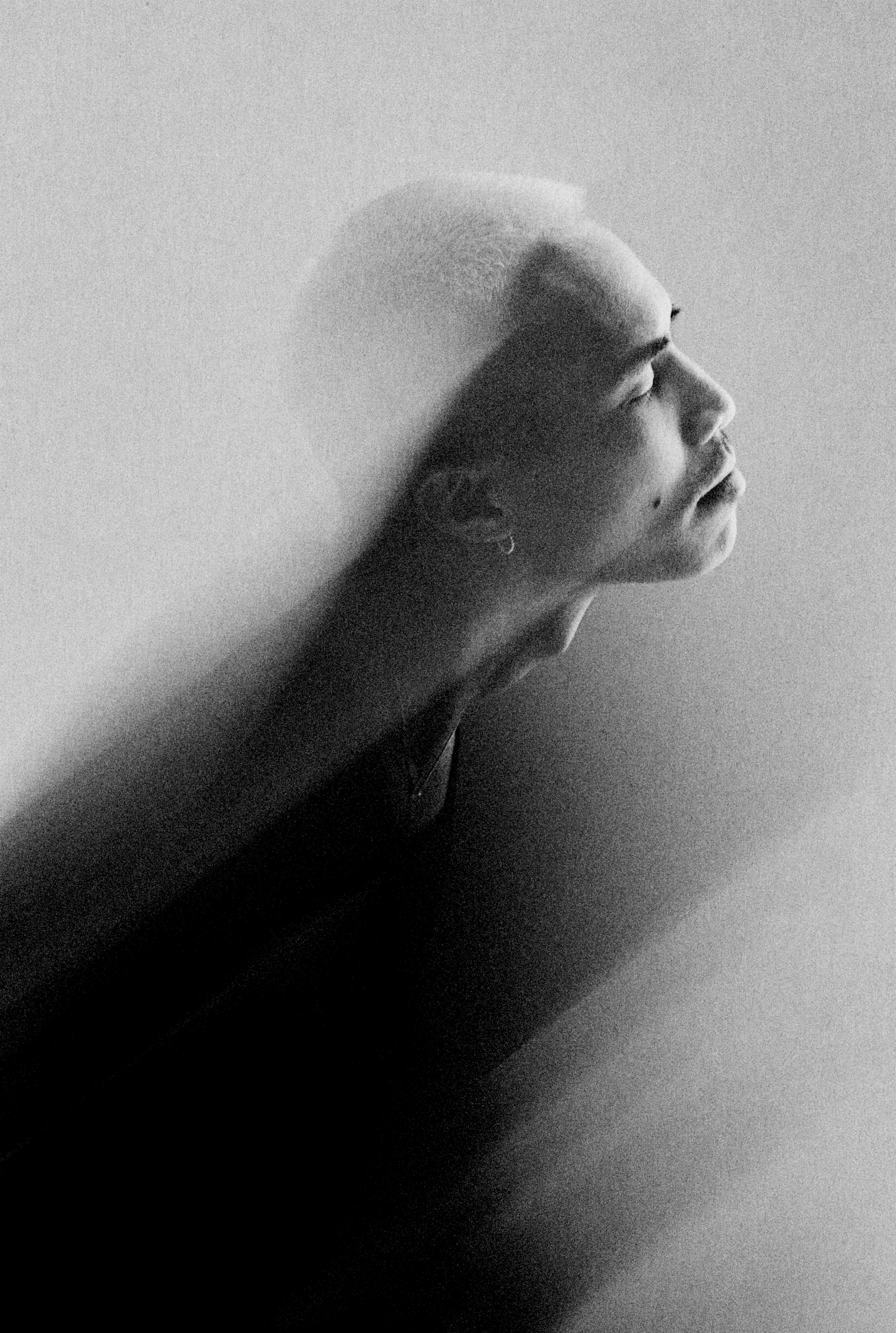 Man with blurred motion effect in profile