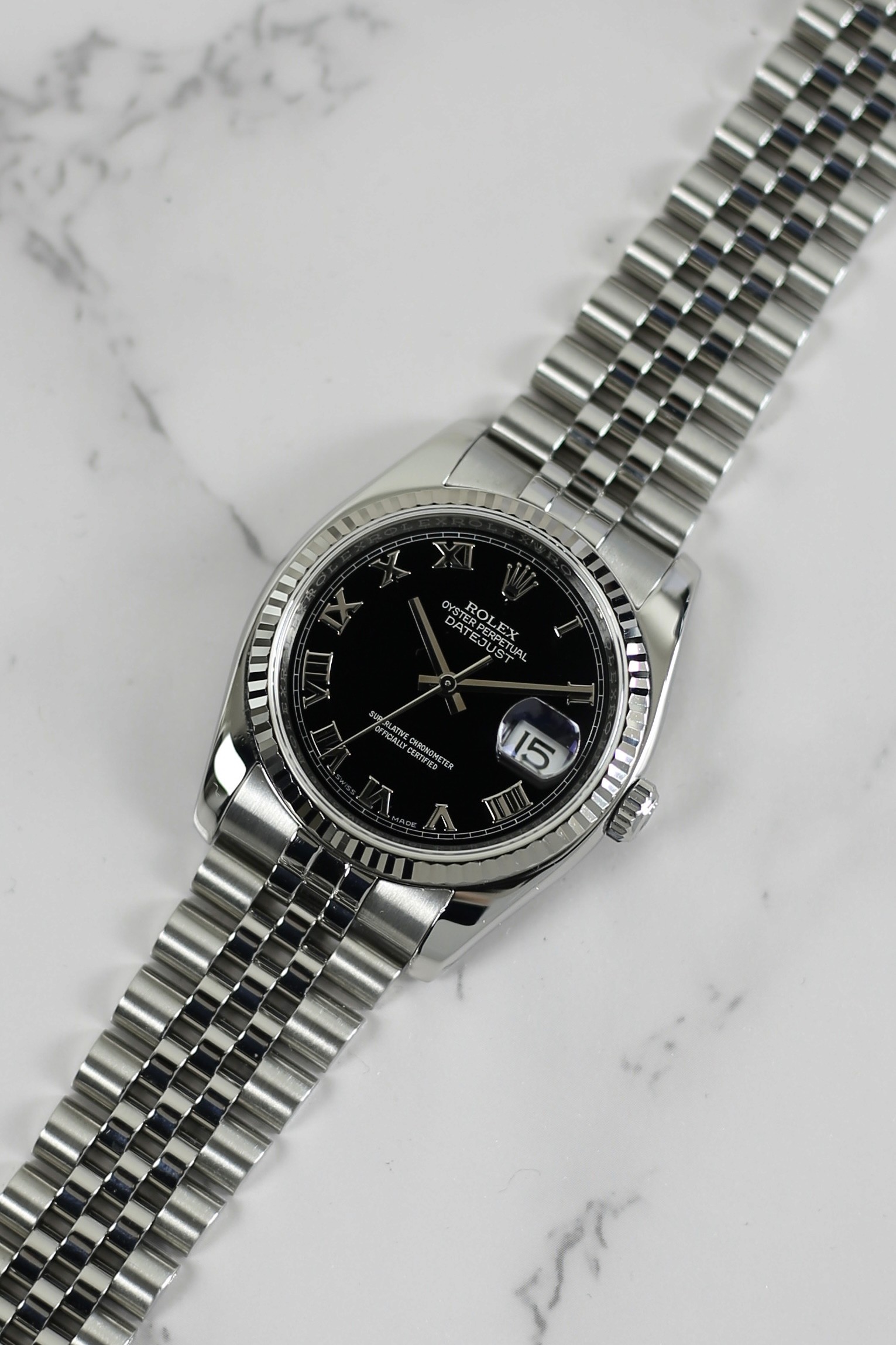 DATEJUST BLACK ROMAN DIAL HIDDEN CLASP 18K WHITE GOLD BEZEL