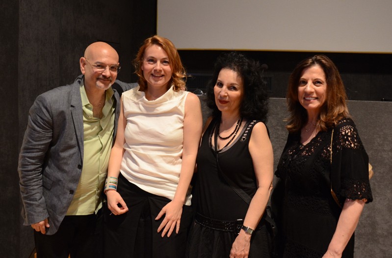 group photo of four people