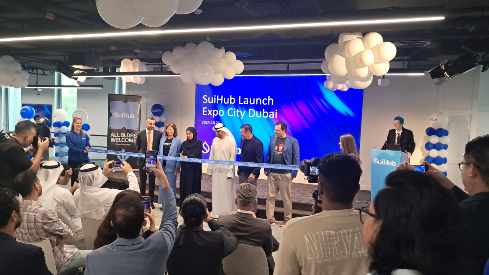 a group of balls sitting on top of a green surface