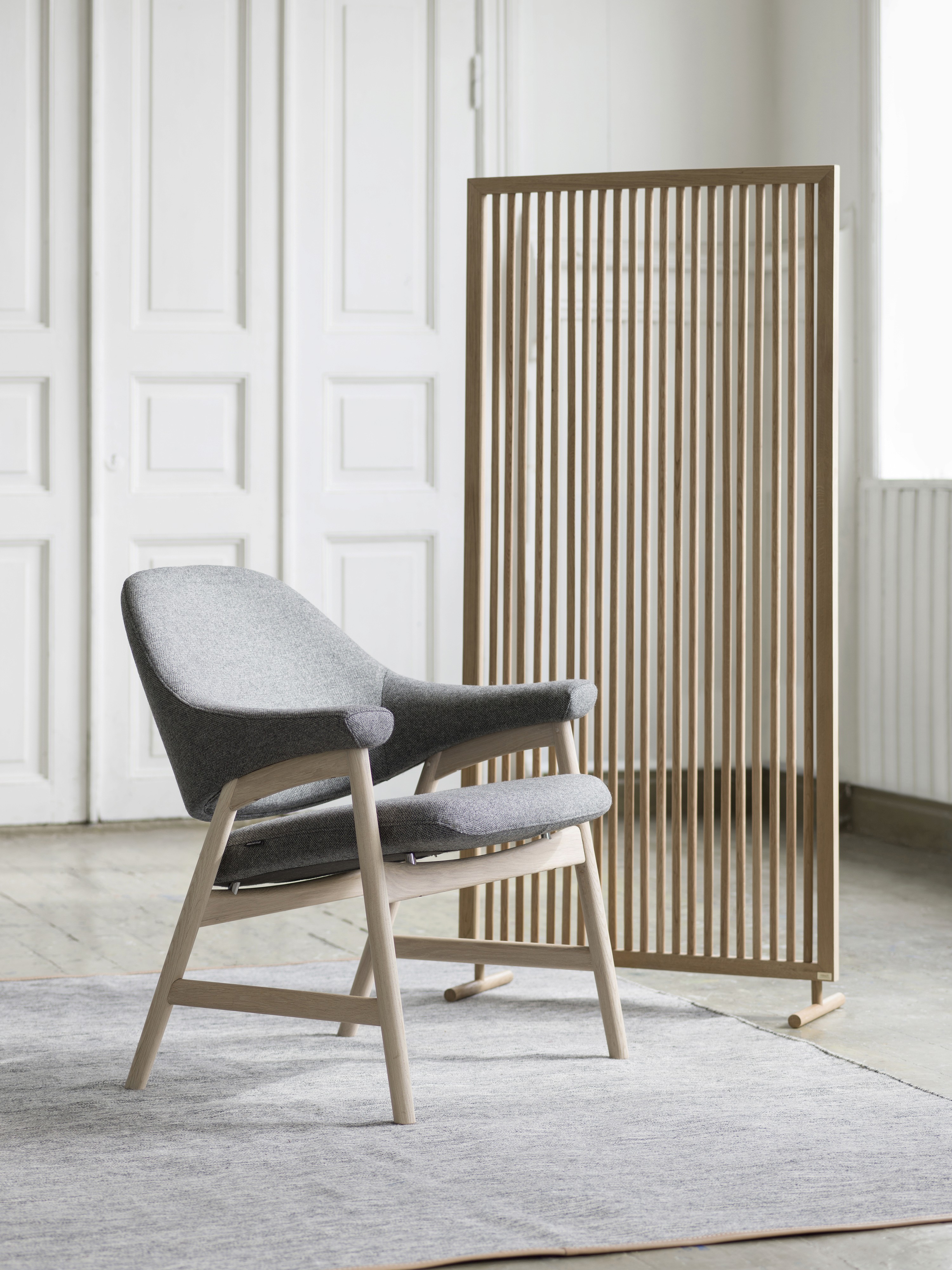 A side profile of a factory worker in a factory