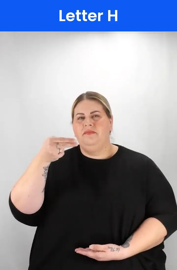 A Deaf signer signs H in ASL