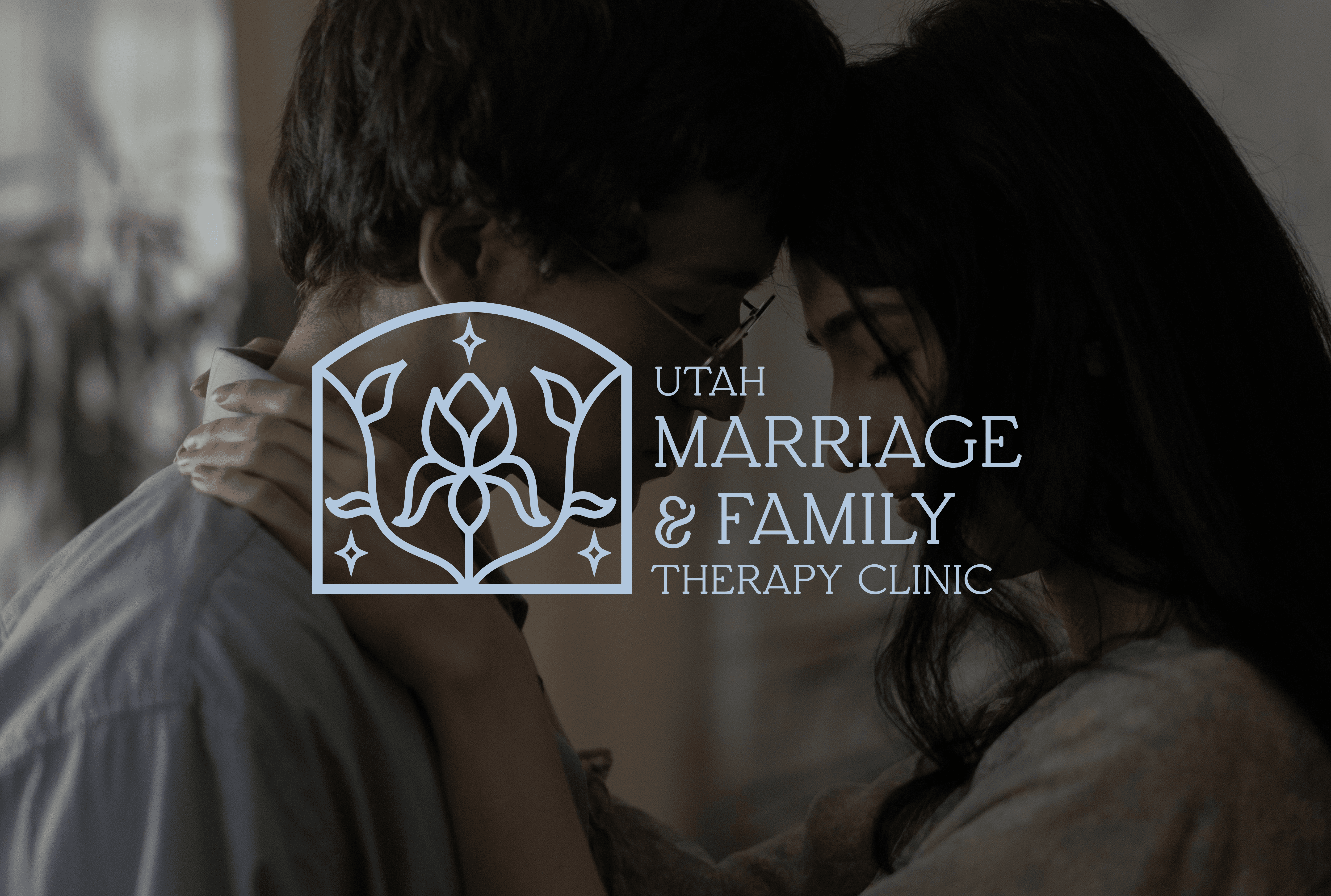 Utah Marriage & Family Therapy Clinic logo over an embracing couple.