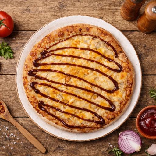 pizza with green leaf vegetable