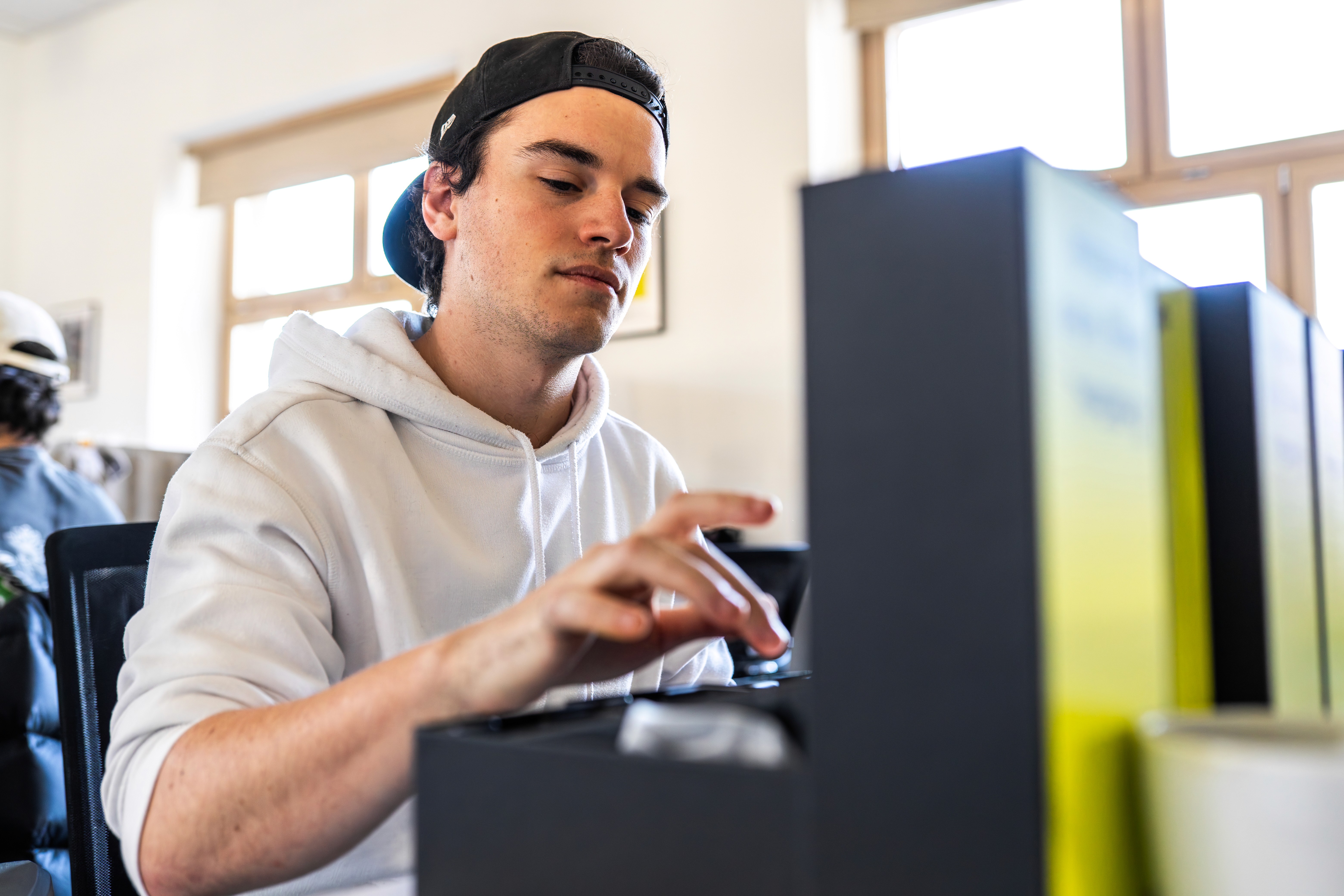 Worker automating his tasks with card machines