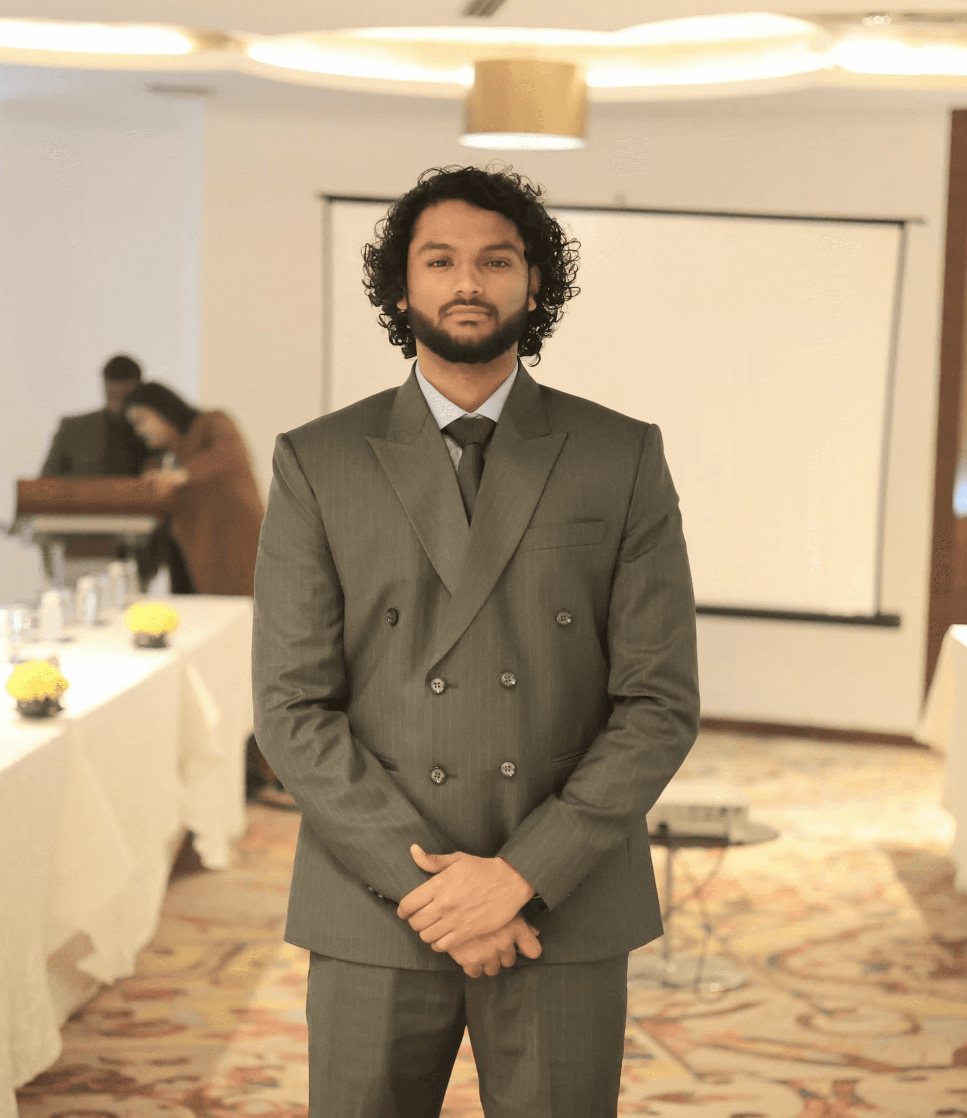 man wearing white V-neck shirt