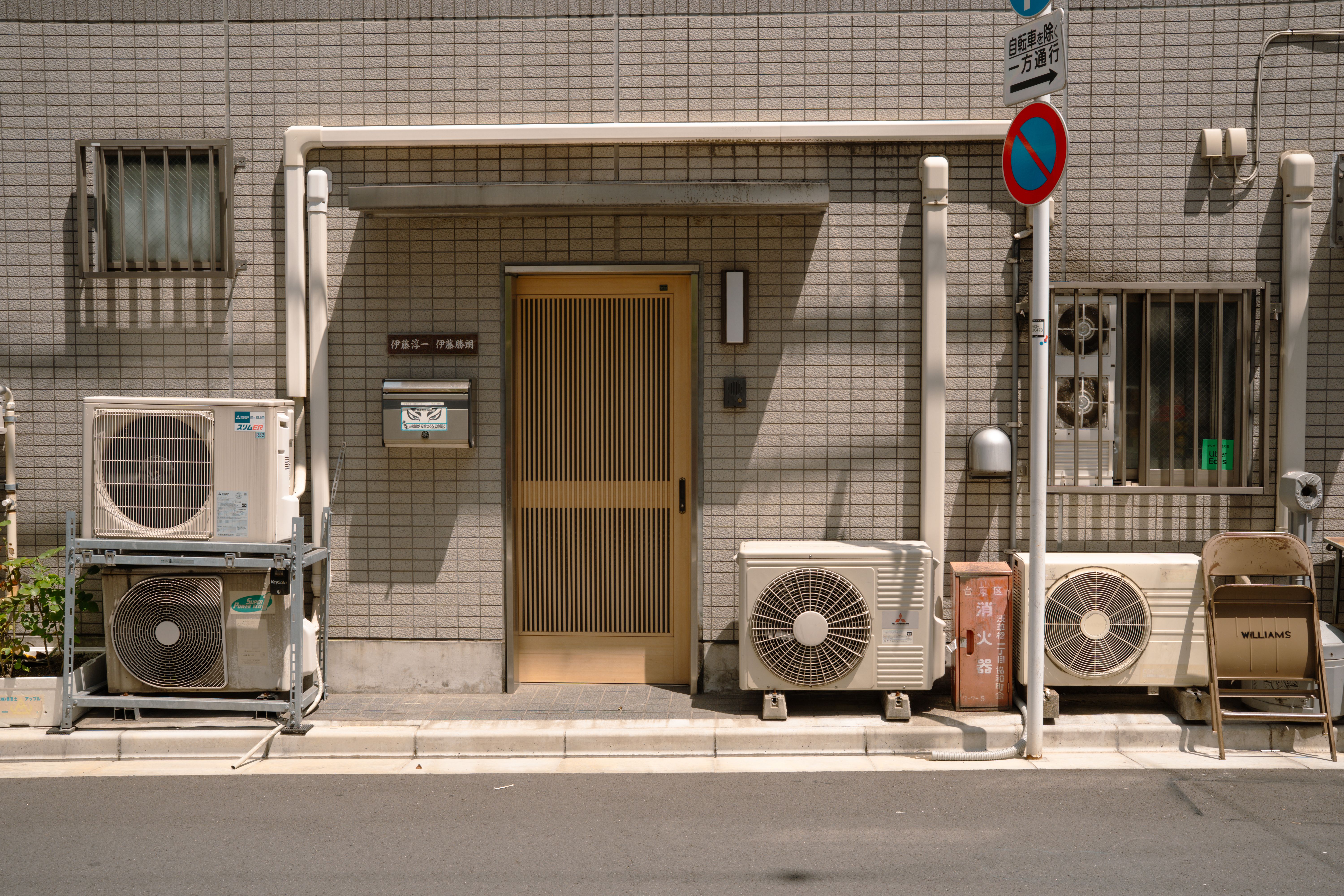 Air source heat pump unit installed outside a UK home, illustrating whether a heat pump can provide whole-house cooling
