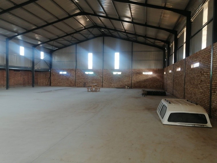 Building and steel roof construction at Bethanie Hardware.