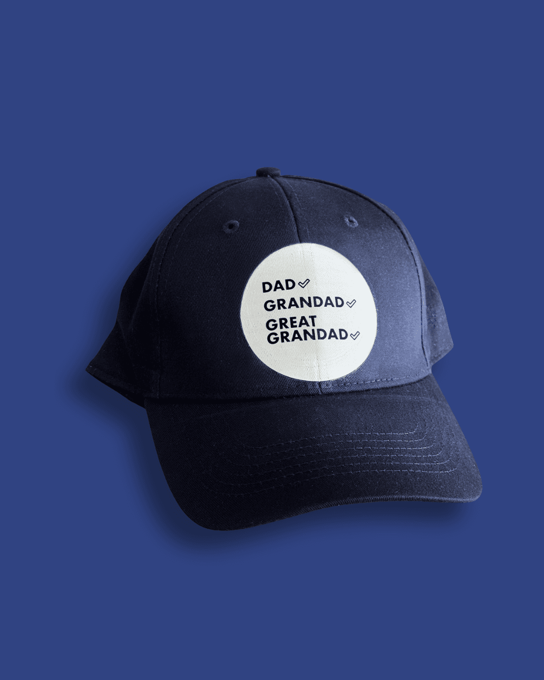 A personalised cap printed with a milestone message, designed to mark a new chapter in the family.