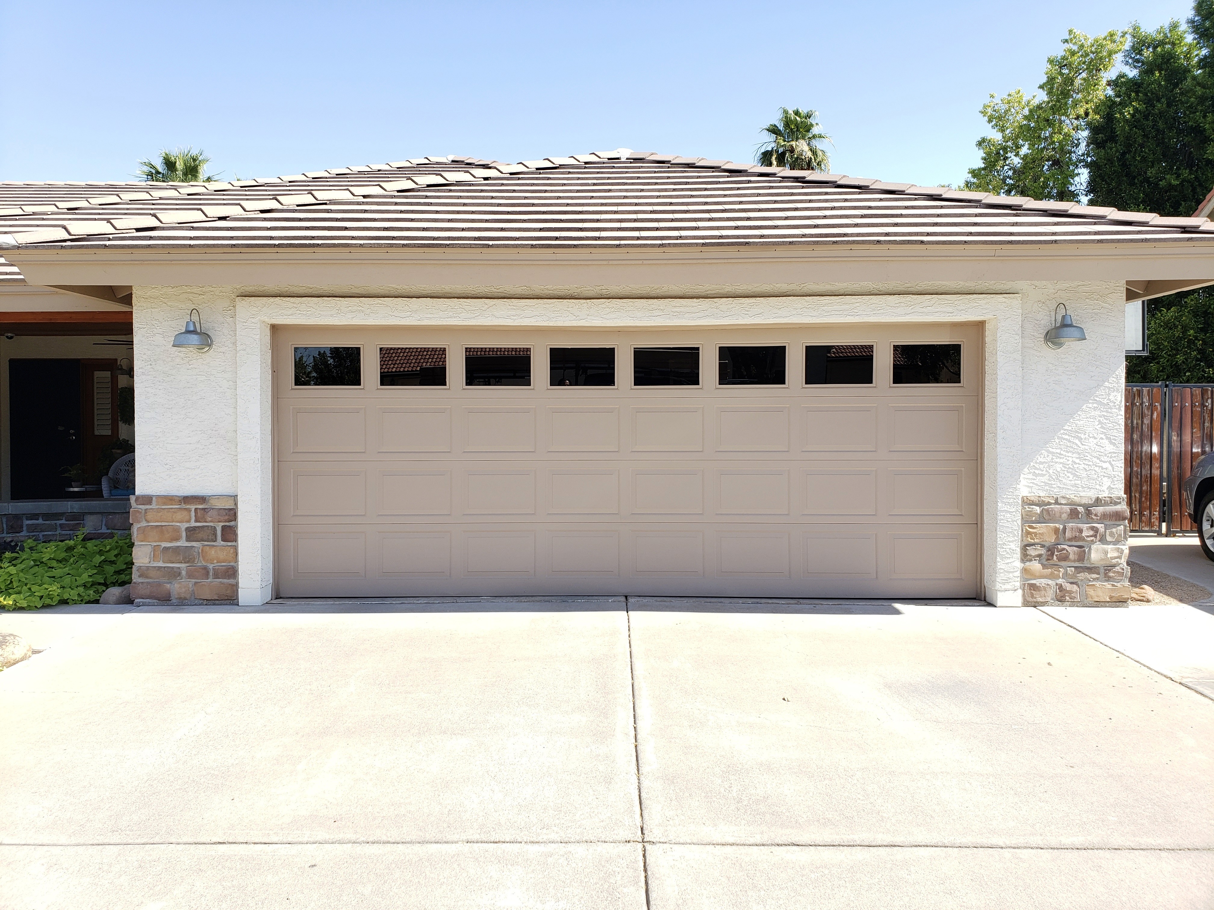 Broken garage door before replacement