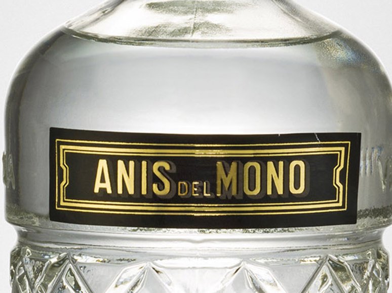 Rustic cabin in a golden field at sunset