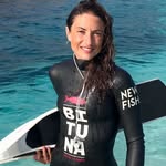 meister woman athlete holding fins photo