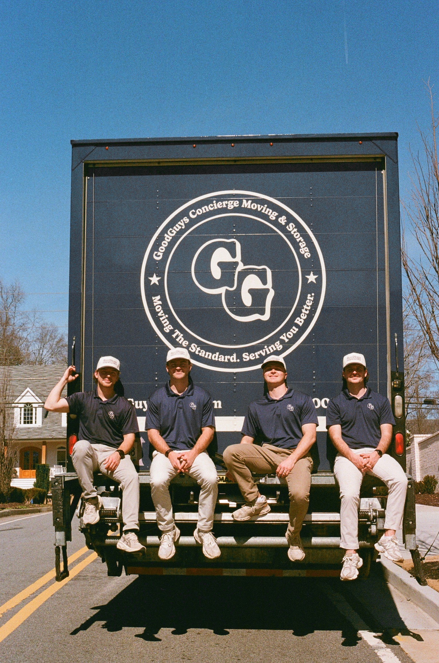 Movers sitting on a tailgate
