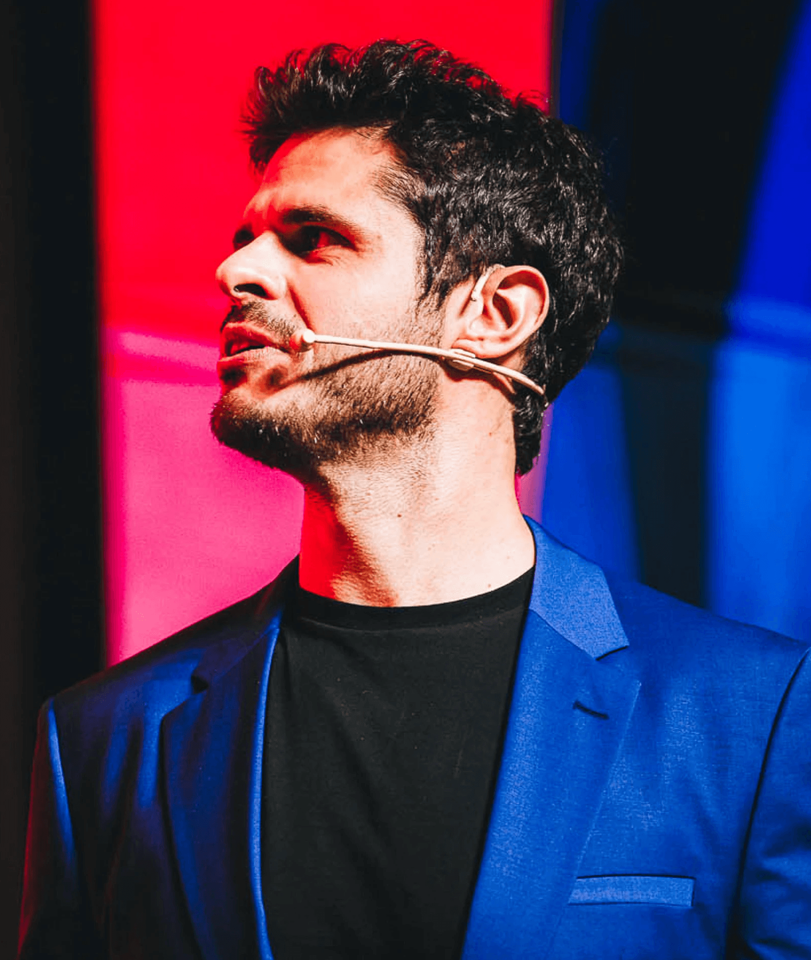 a man holding a microphone in his hands